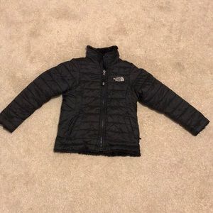 Girls north face reversible coat.